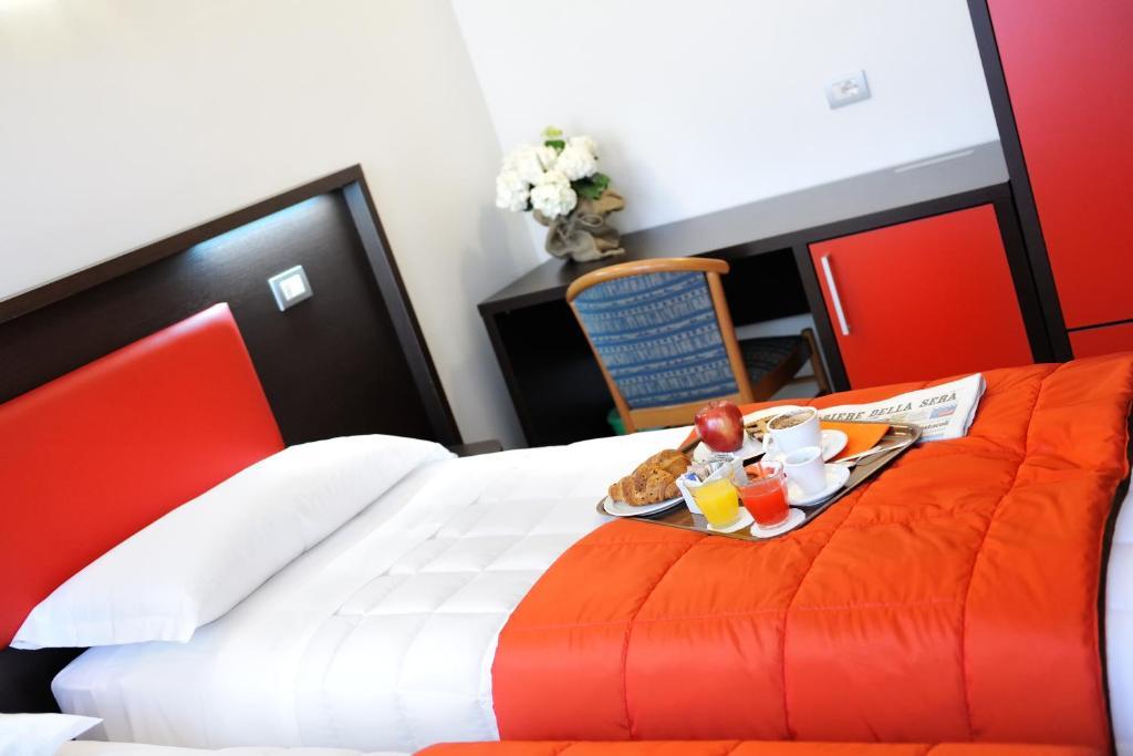 לנגנו Hotel Al Corso חדר תמונה